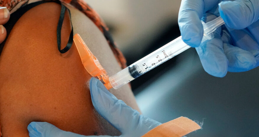 Lisa Domski, a 30-year employee of Blue Cross Blue Shield of Michigan, was fired in 2021 when she declined to take the COVID-19 vaccine, citing religious reasons. (Associated Press file)