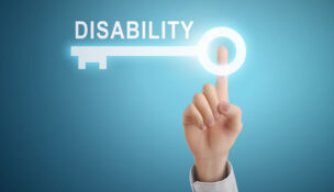male hand pressing disability key button